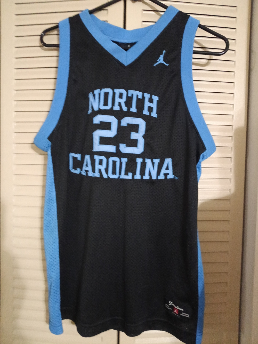 Jordan North Carolina #23 Black and Carolina Blue Basketball Jersey